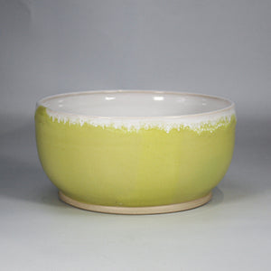 Pottery handmade yellow and white bowl