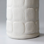 Load image into Gallery viewer, Close up of bottom of white porcelain vase 
