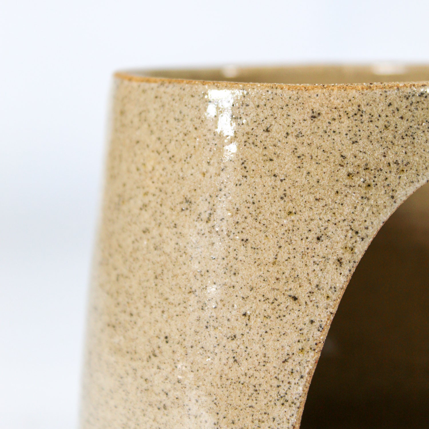 Close up of speckled glaze to handmade pottery wax melt burner 