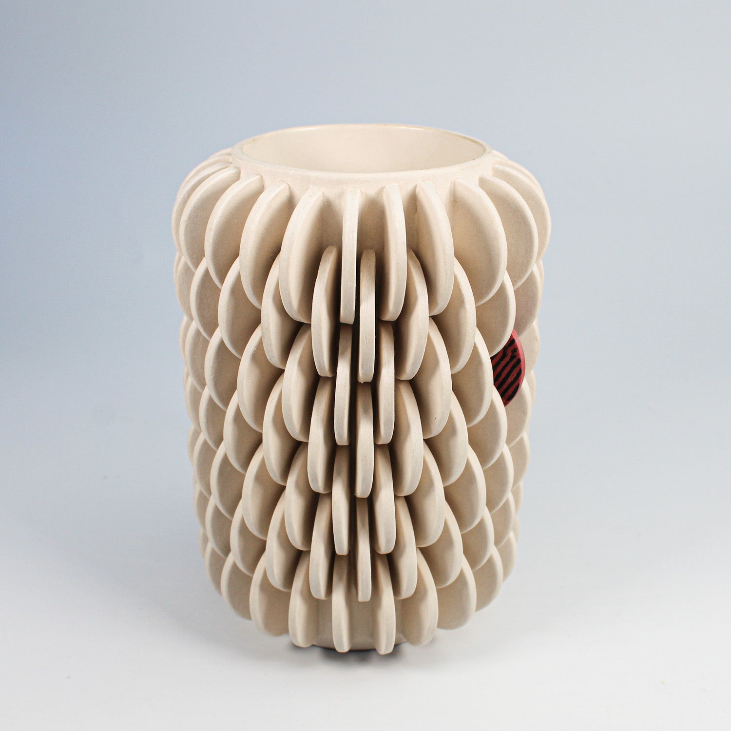 Porcelain disc vase