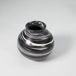 Load image into Gallery viewer, Handmade pottery mini moon jar in black glaze with white swirls
