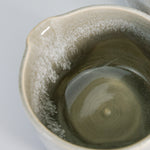 Load image into Gallery viewer, Close up of inside of grey glazed pottery gravy jug 
