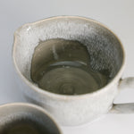 Load image into Gallery viewer, Inside view of large grey glazed pottery gravy jug 
