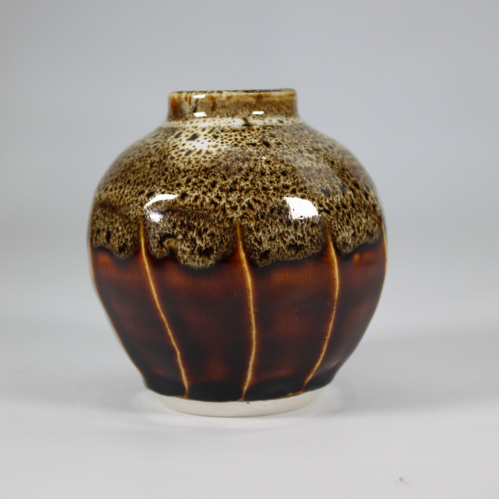Handmade pottery mini jar in brown animal print 