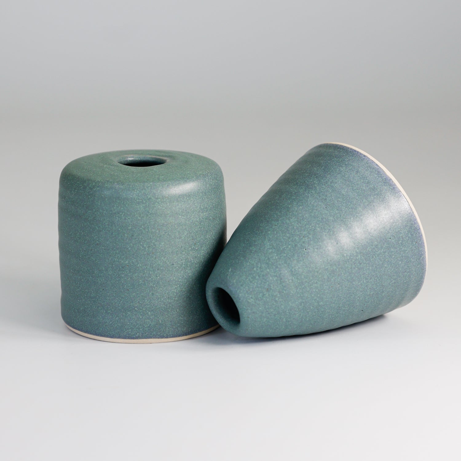 Pair of blue handmade pottery bud vases 
