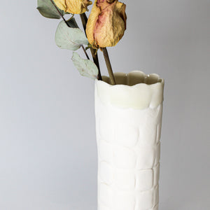 Top of tall white porcelain vase 