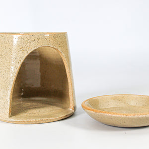 Top and bottom of handmade pottery wax melt burner side by side 
