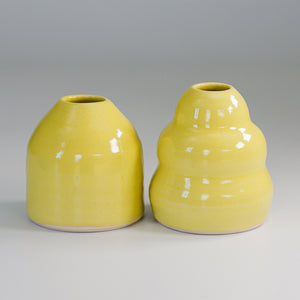 Pair of handmade small yellow pottery vases 